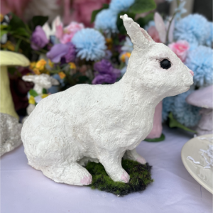 Bunny sculpture squatting